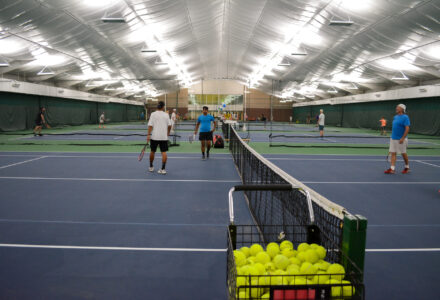 Playing in the tennis house